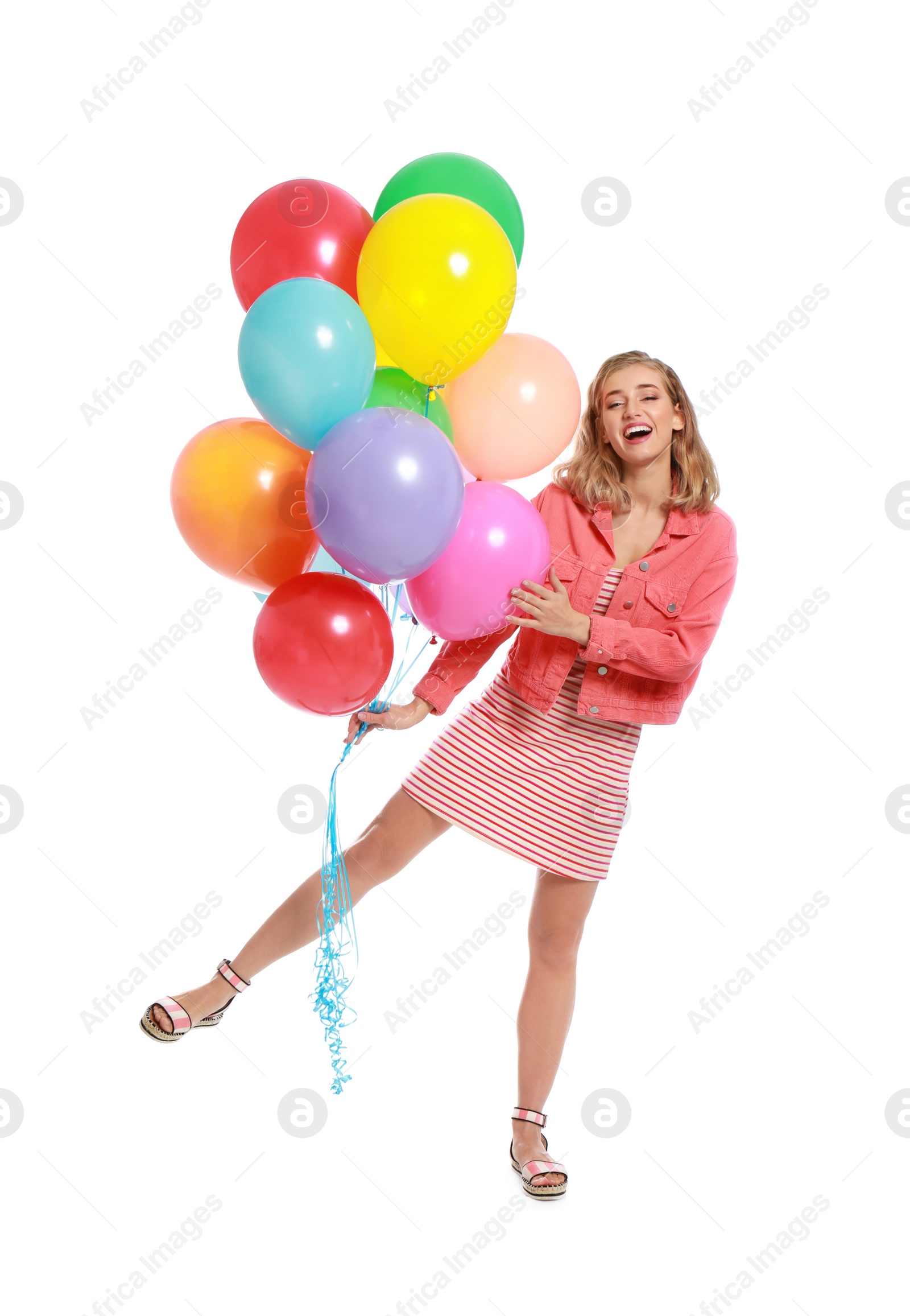 Photo of Young woman holding bunch of colorful balloons on white background