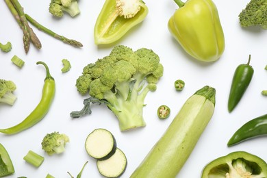 Photo of Flat lay composition with fresh vegetables on white background