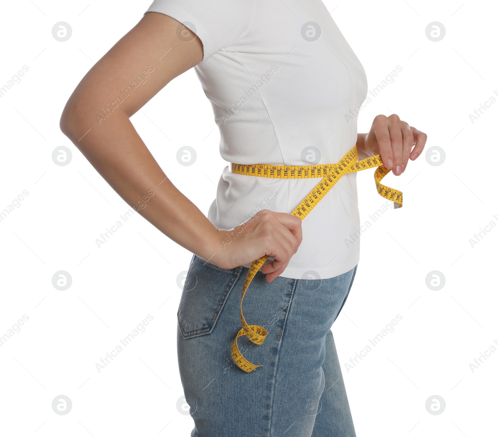 Photo of Woman measuring waist with tape on white background, closeup