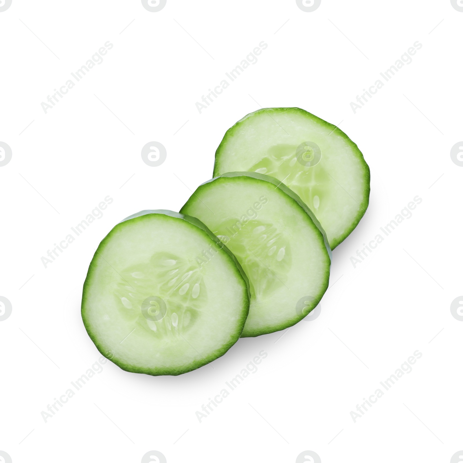 Photo of Slices of fresh green cucumber isolated on white, top view