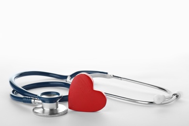 Photo of Stethoscope with heart on white background. Health care