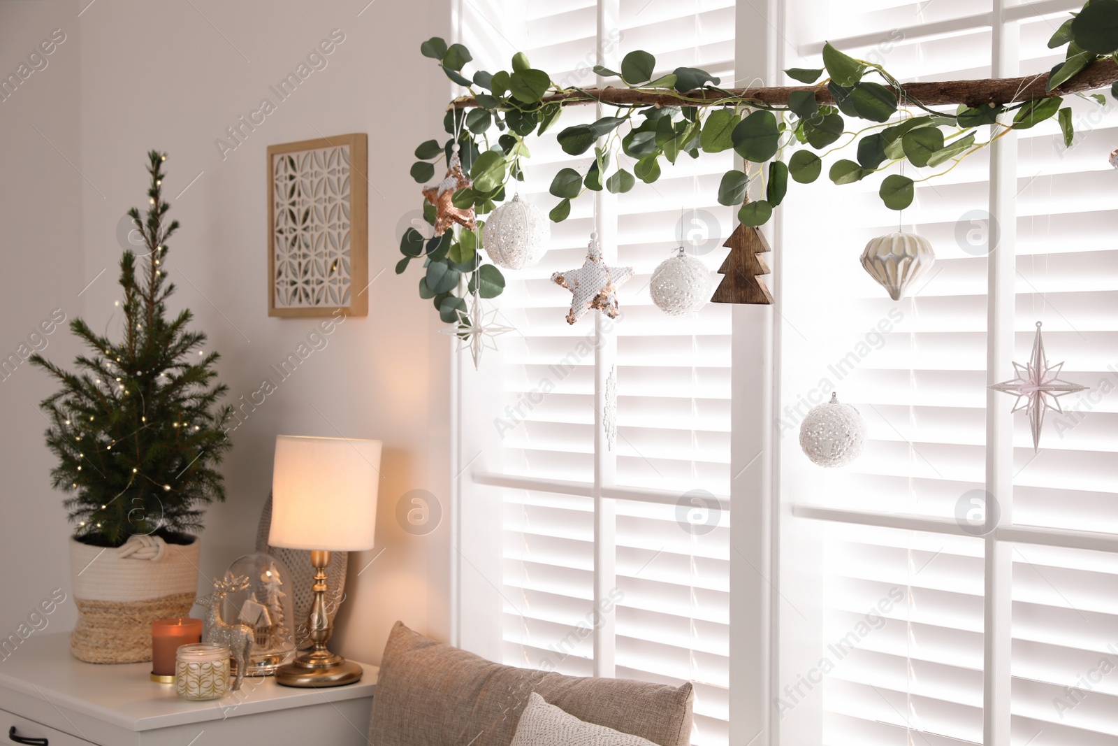 Photo of Beautiful room interior decorated for Christmas with potted fir