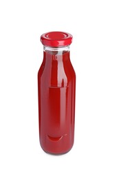 Glass bottle of tasty ketchup isolated on white