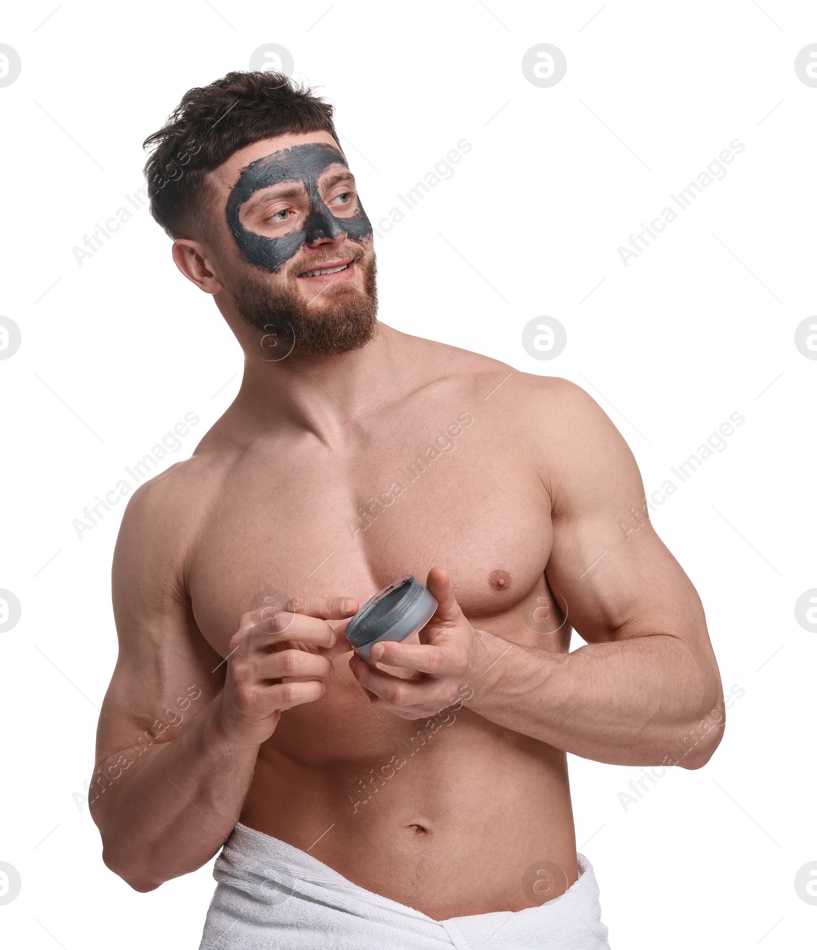 Photo of Handsome man with clay mask on his face against white background