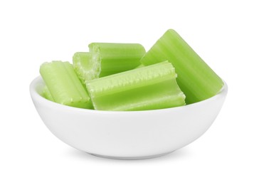 Photo of Bowl of fresh cut celery isolated on white