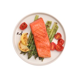 Photo of Tasty grilled salmon with asparagus, tomatoes, spices and lemon isolated on white, top view