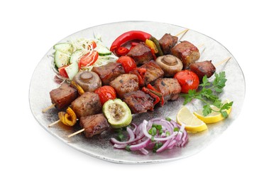 Plate of delicious shish kebabs with vegetables isolated on white