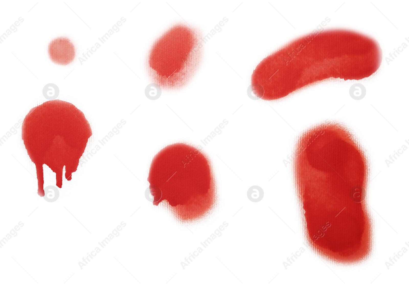 Photo of Spots drawn by red spray paint on white background