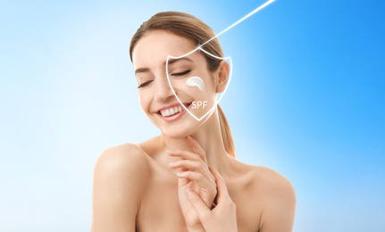 Image of SPF shield and beautiful young woman with healthy skin on blue background. Sun protection cosmetic product