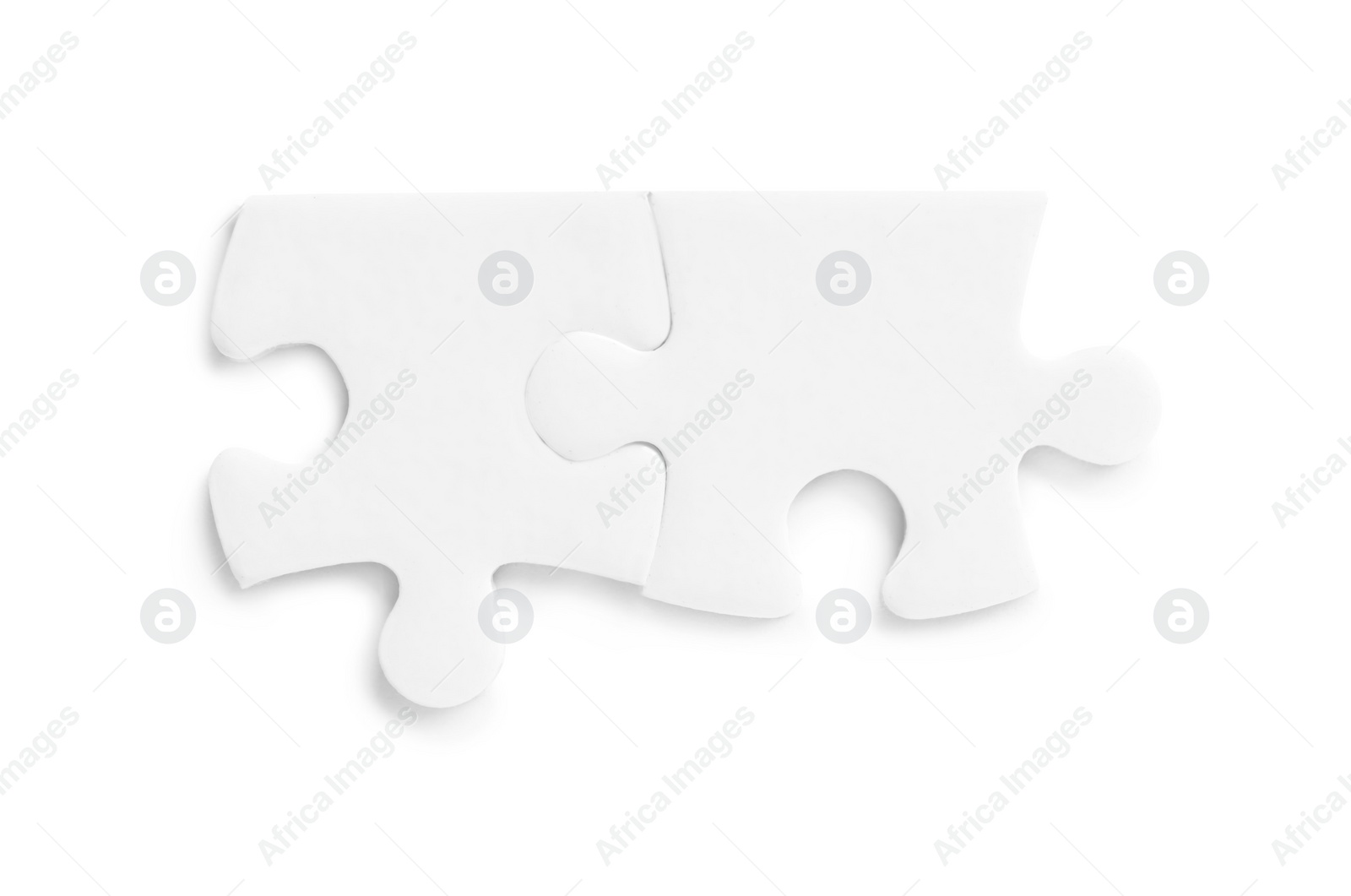 Photo of Blank puzzle pieces isolated on white, top view