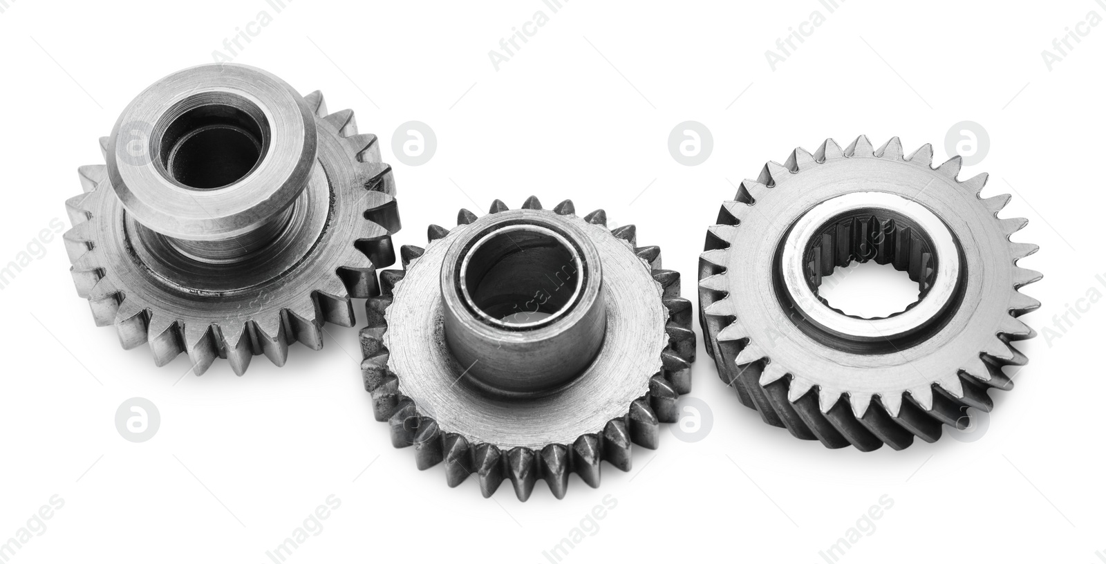 Photo of Different stainless steel gears on white background