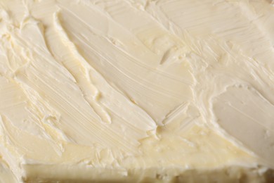 Photo of Piece of tasty homemade butter as background, closeup