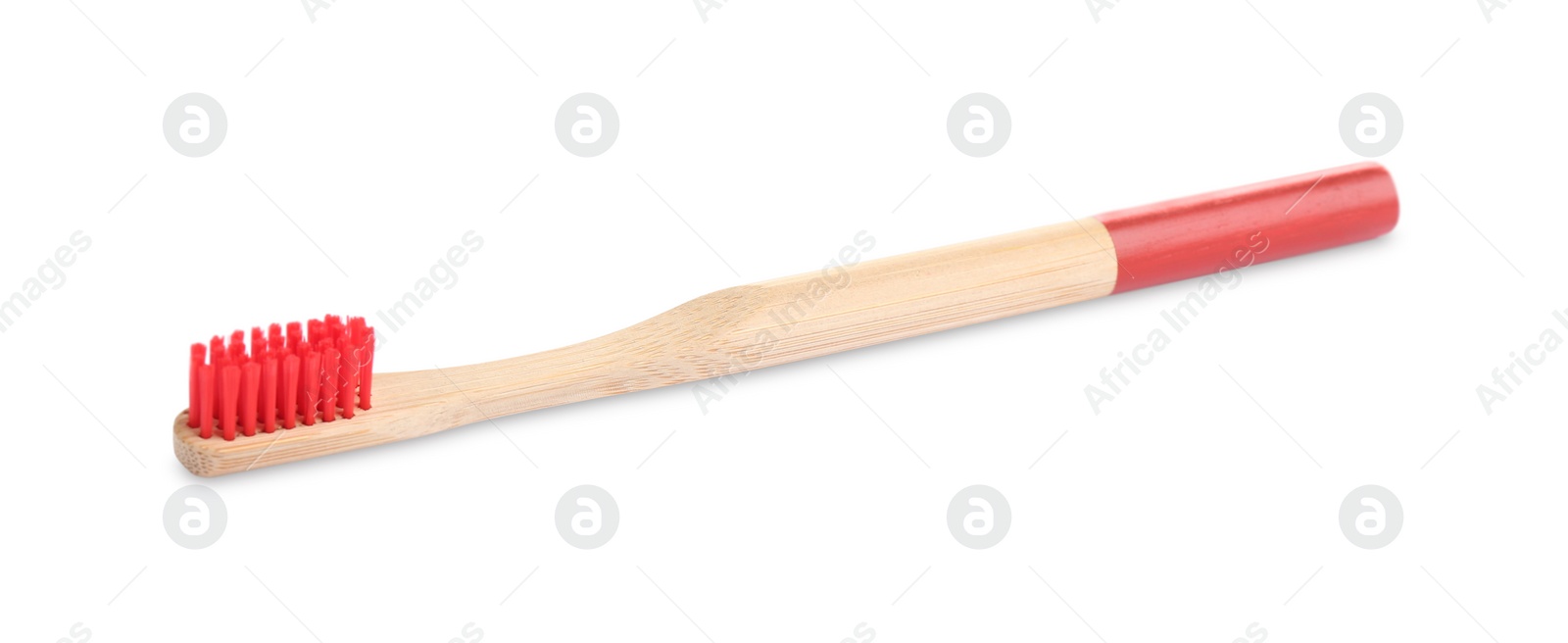 Photo of Bamboo toothbrush with red bristle isolated on white