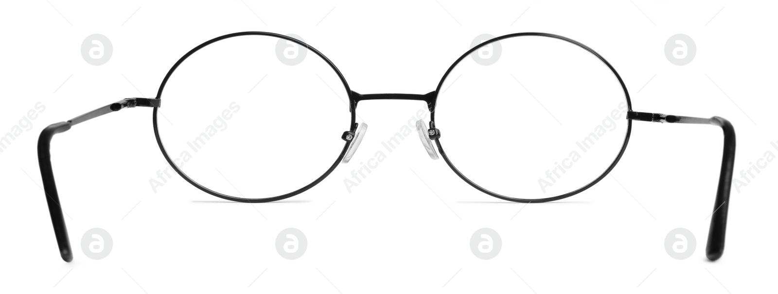 Photo of Round glasses with black frame isolated on white