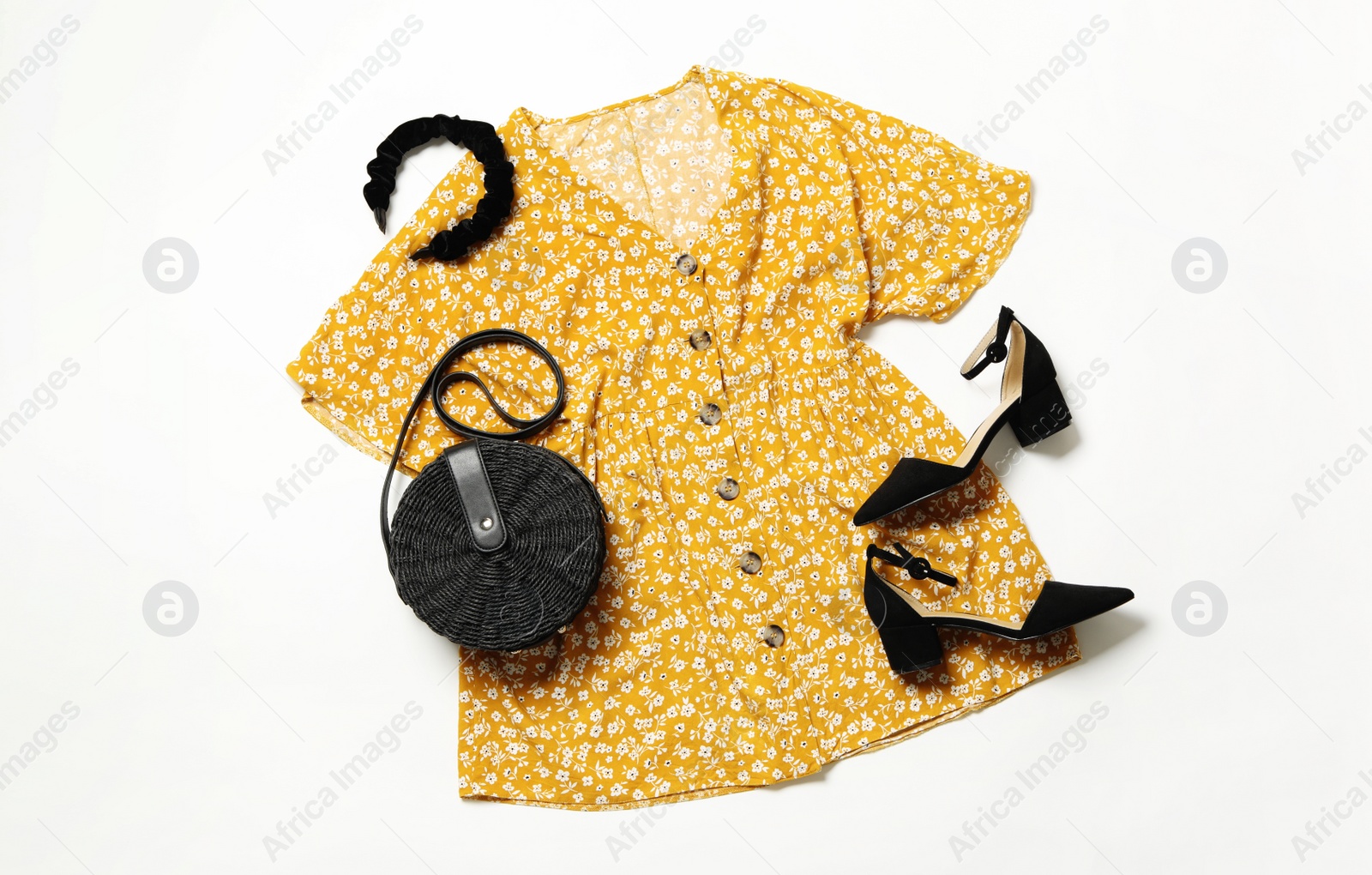 Photo of Flat lay composition with stylish yellow dress on white background