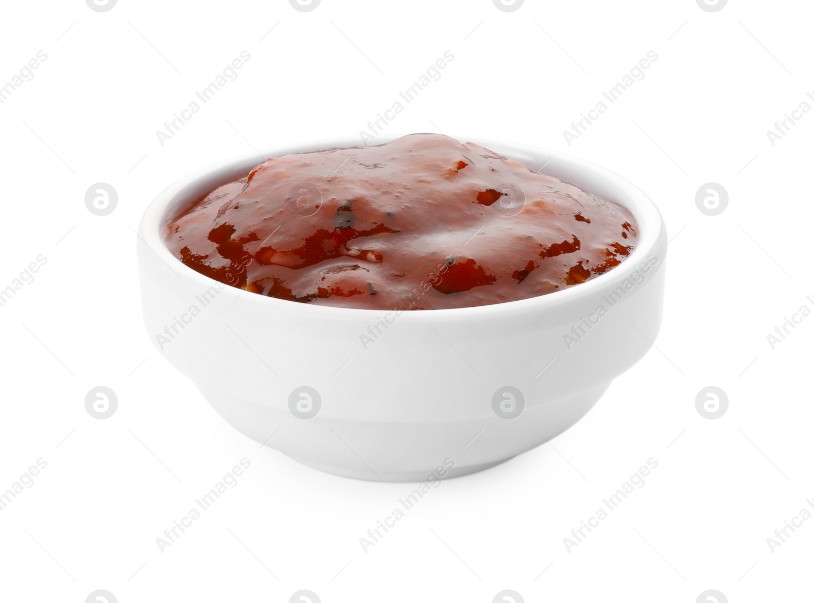 Photo of Tasty tomato sauce in bowl isolated on white