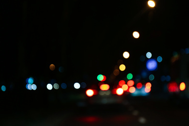 Photo of Blurred view of city at night. Bokeh effect