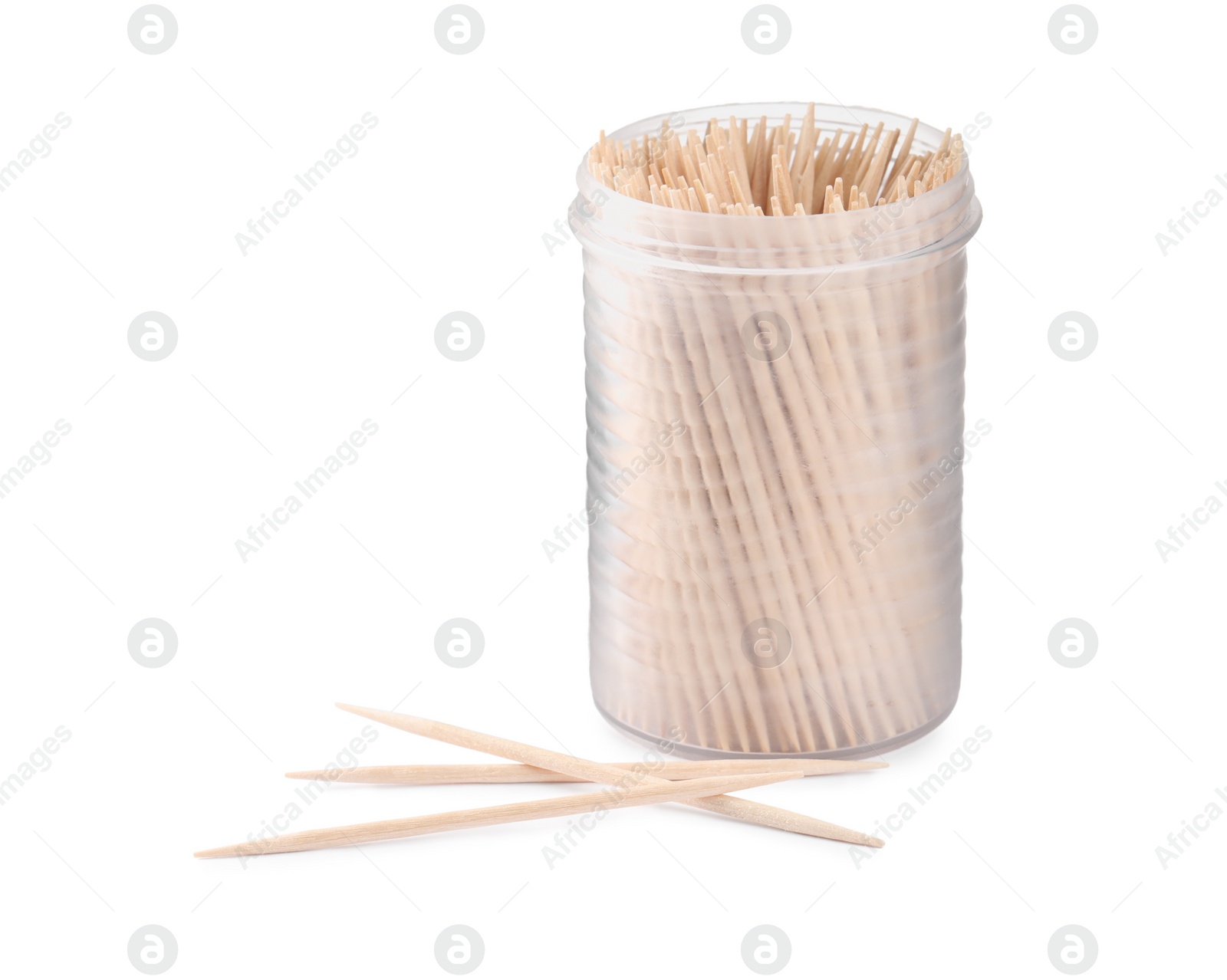 Photo of Wooden toothpicks and holder on white background