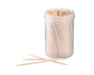 Photo of Wooden toothpicks and holder on white background