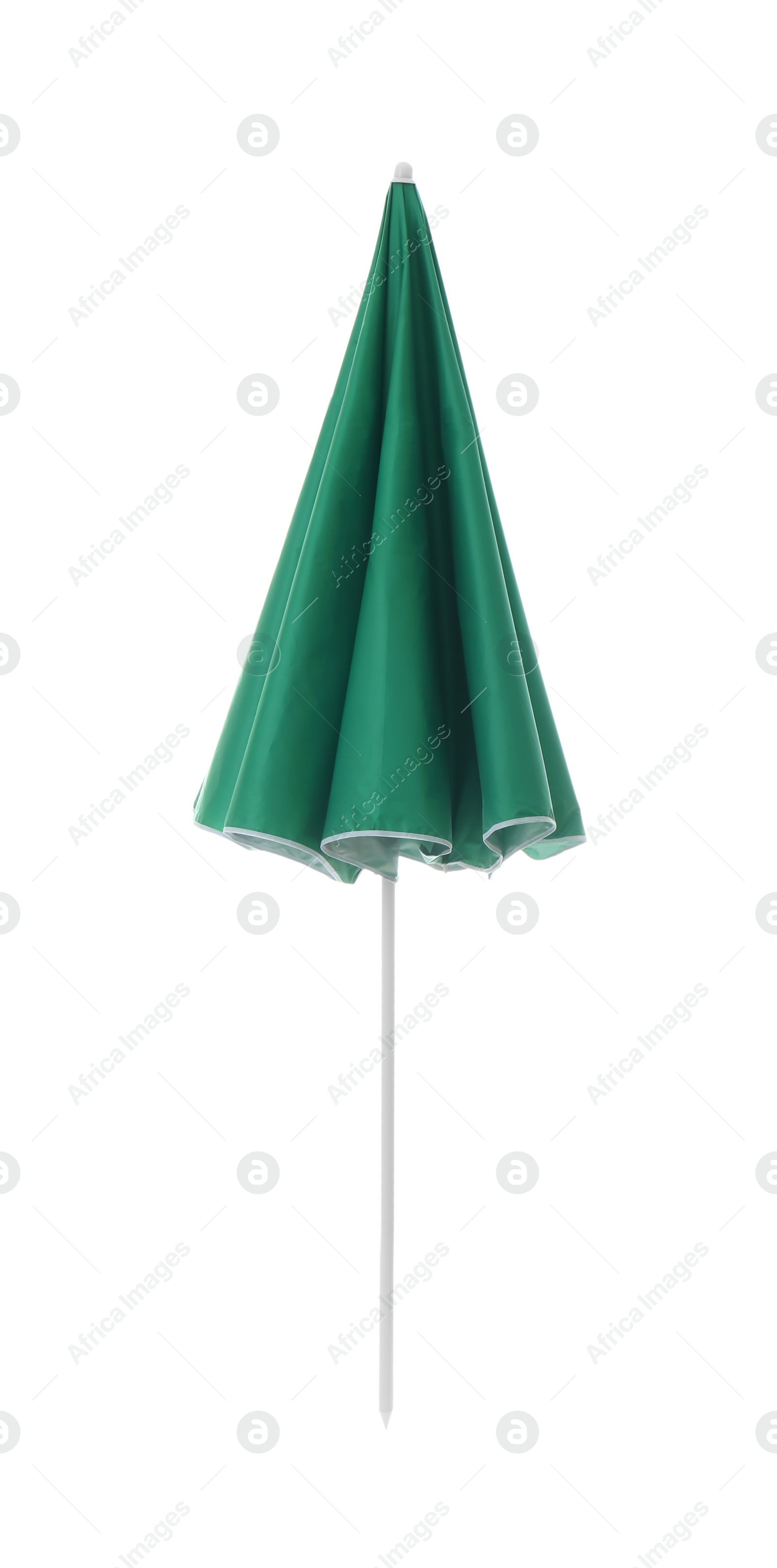 Photo of Closed green beach umbrella isolated on white