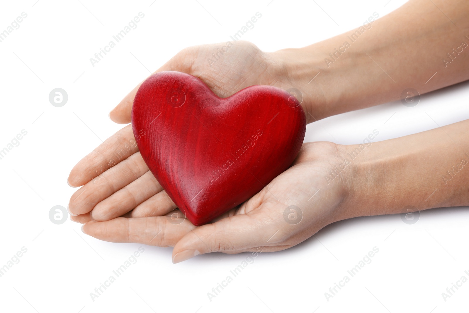 Photo of Woman holding red heart on white background, closeup. Cardiology concept