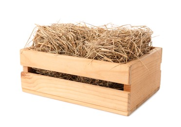 Photo of Dried hay in wooden crate on white background