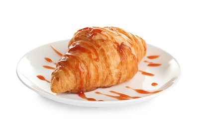 Plate of fresh croissant with jam on white background. French pastry