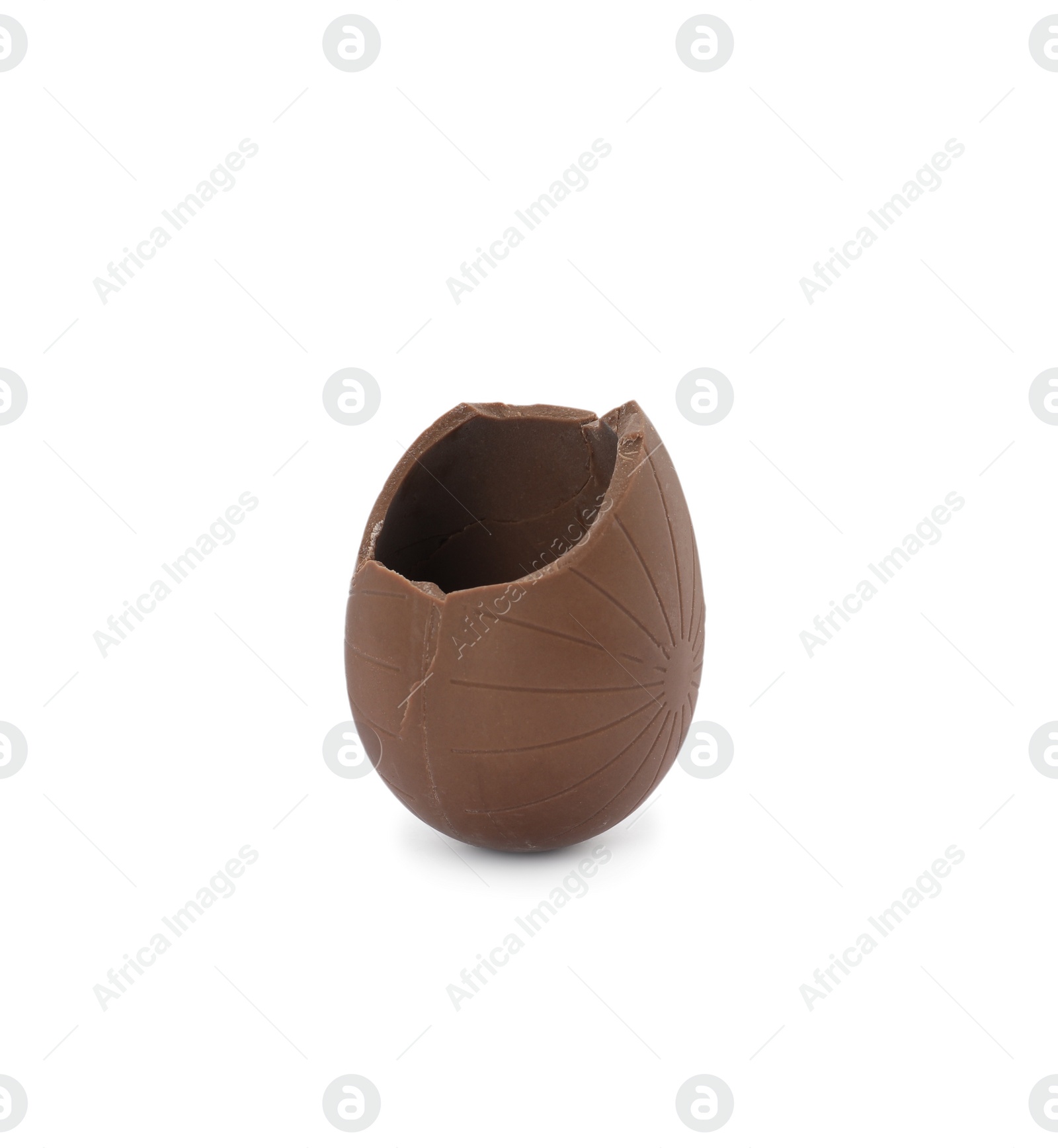 Photo of Broken milk chocolate egg on white background