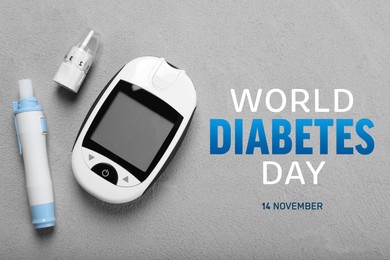 Image of World Diabetes Day. Digital glucometer and lancet pen on grey table, flat lay