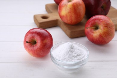 Photo of Sweet powdered fructose and fresh apples on white wooden table