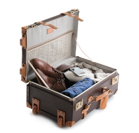 Packed suitcase with warm clothes and smartphone on white background