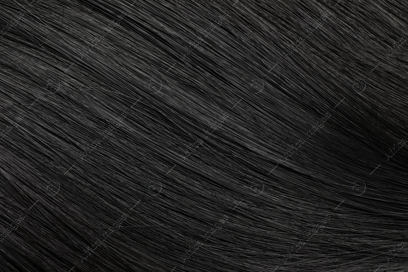 Photo of Beautiful black hair as background, closeup view