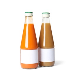 Photo of Tasty drinks in bottles with blank labels on white background. Mock up for design