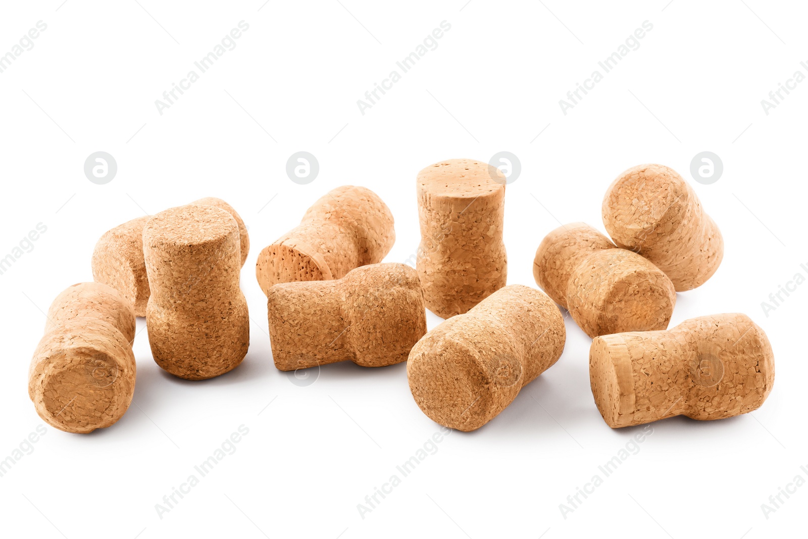 Photo of Many sparkling wine corks on white background