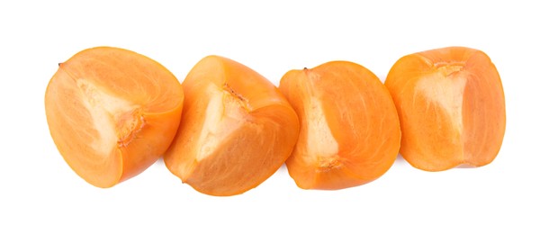 Photo of Cut delicious ripe juicy persimmons on white background, top view