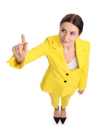 Photo of Beautiful businesswoman in yellow suit pointing at something on white background, above view