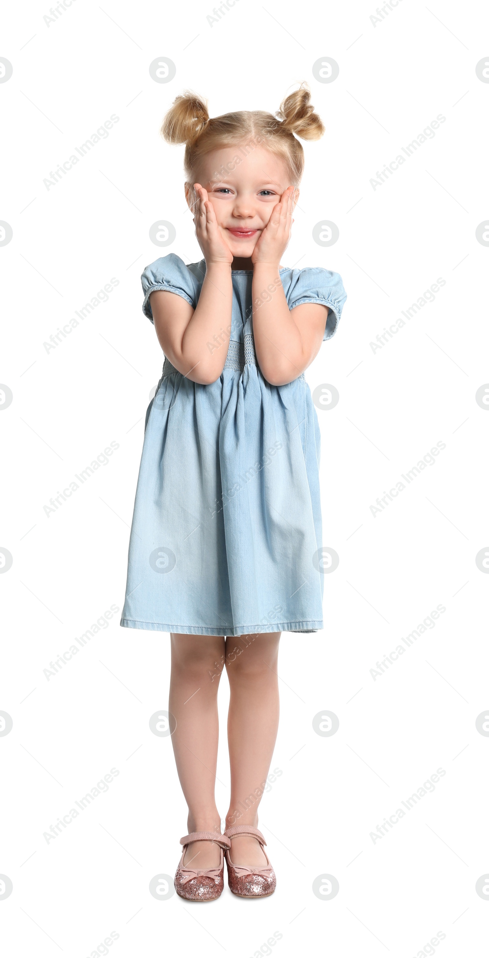 Photo of Cute little girl posing on white background