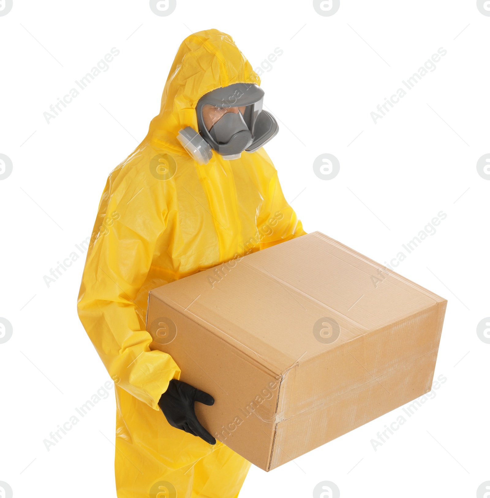 Photo of Man wearing chemical protective suit with cardboard box on white background. Prevention of virus spread