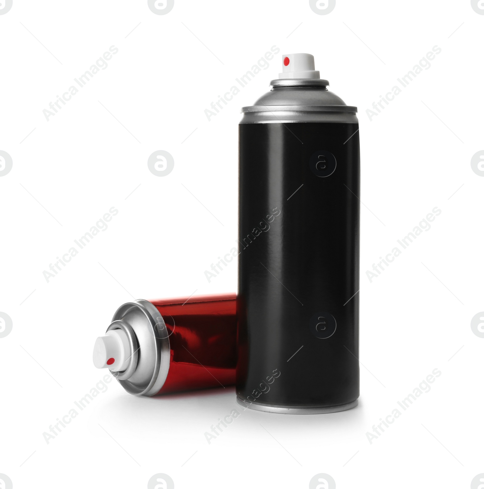 Photo of Different cans of spray paints on white background