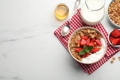 Photo of Flat lay composition with tasty granola and ingredients served on white marble table. Space for text