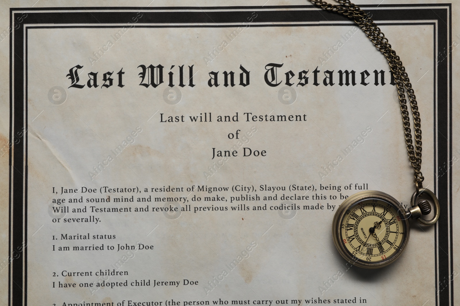 Photo of Last Will and Testament with pocket watch, top view