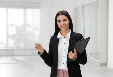 Female real estate agent showing new apartment