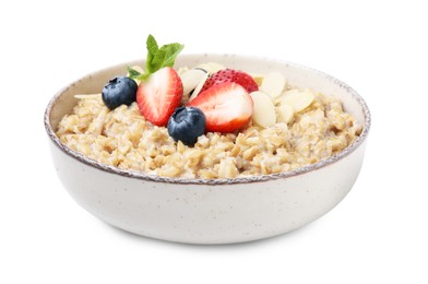 Photo of Tasty oatmeal with strawberries, blueberries and almond flakes in bowl isolated on white