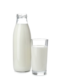 Photo of Glass and bottle with fresh milk on white background