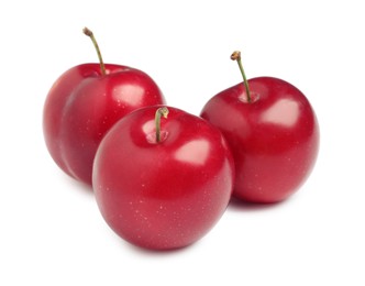Photo of Delicious ripe cherry plums on white background