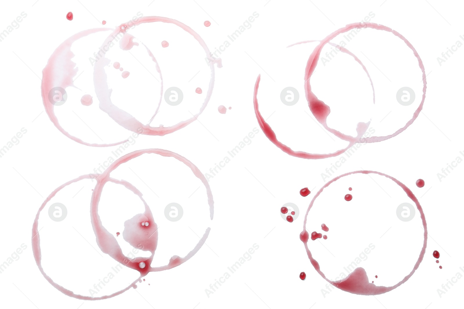 Photo of Many wine rings and drops on white background, top view