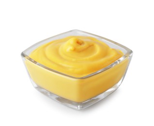 Photo of Bowl with delicious mustard on white background