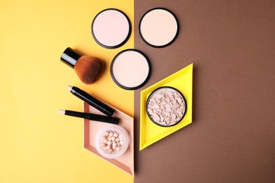 Photo of Flat lay composition with various makeup products on color background