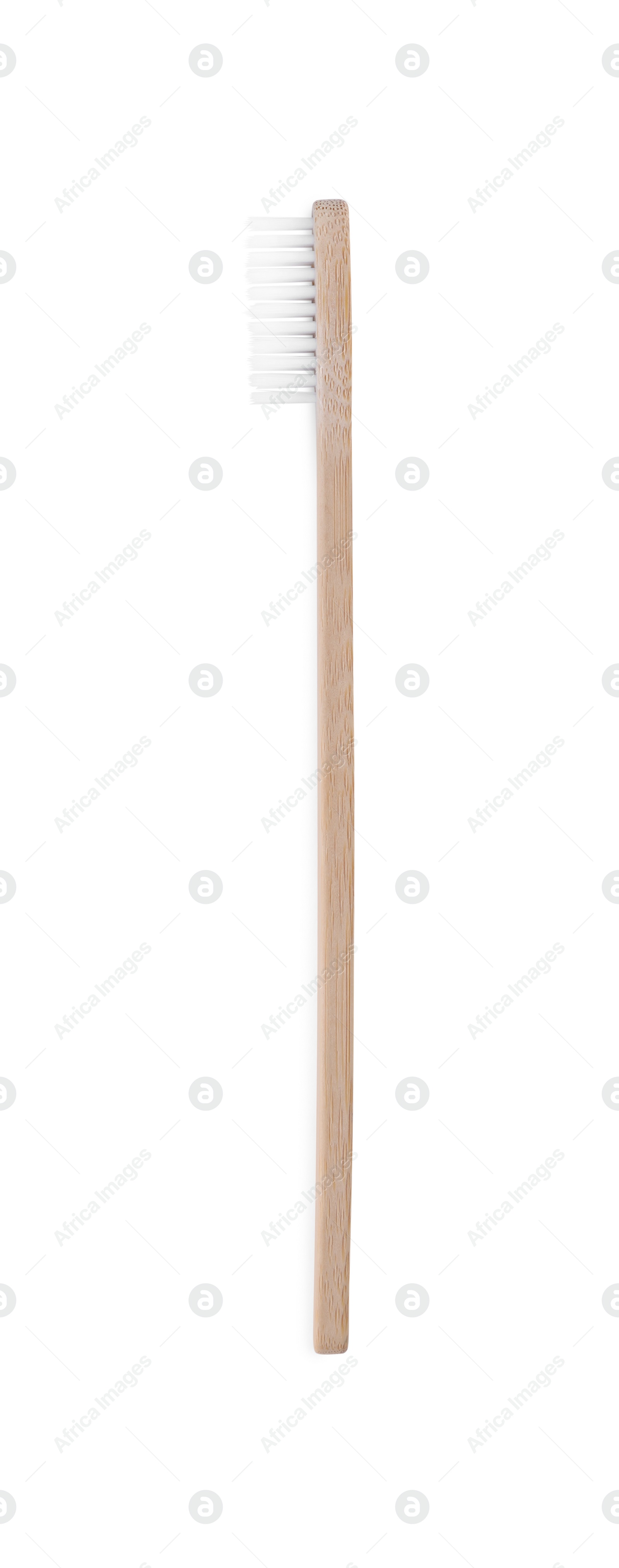 Photo of One bamboo toothbrush isolated on white, top view