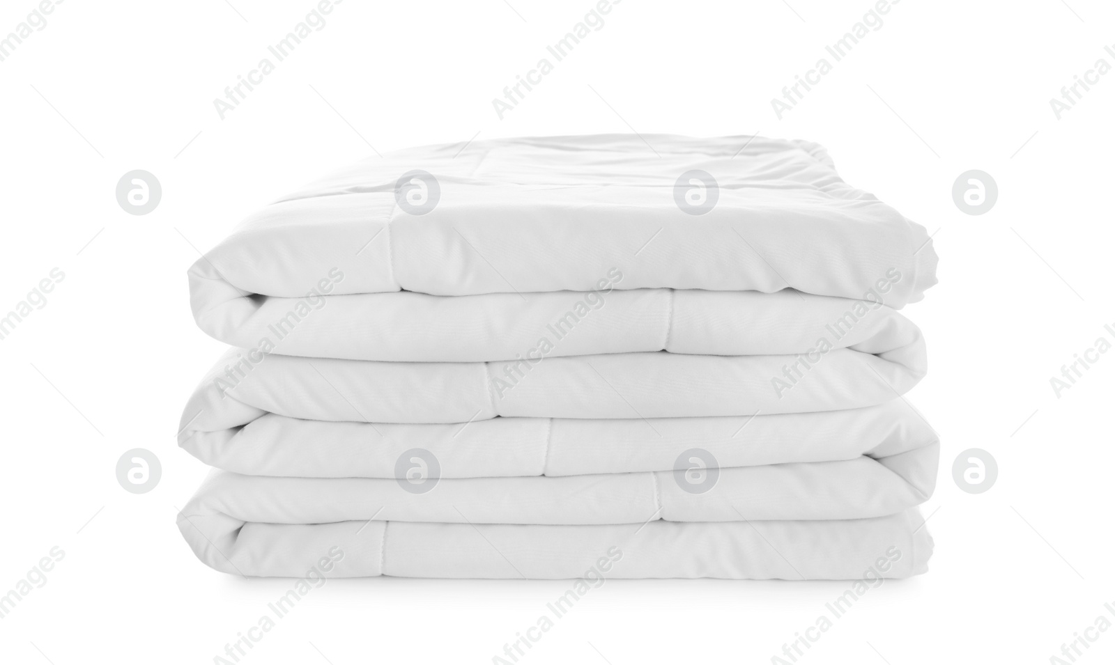 Photo of Folded clean blanket isolated on white. Household textile